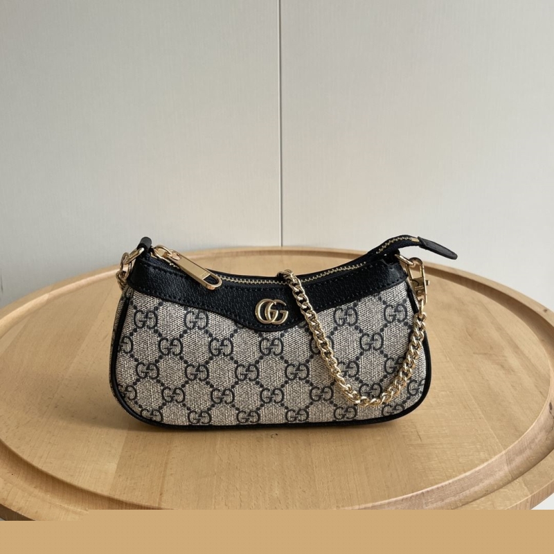 G*u*i top handle bags